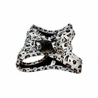 Leopard print dog harness on a white background