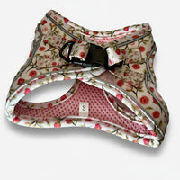 Floral-patterned dog harness on a white background