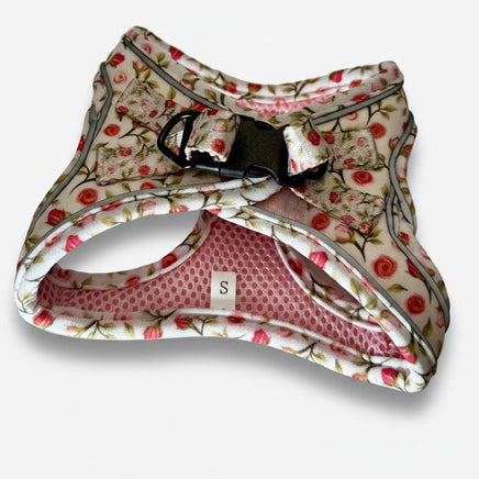 Floral-patterned dog harness on a white background