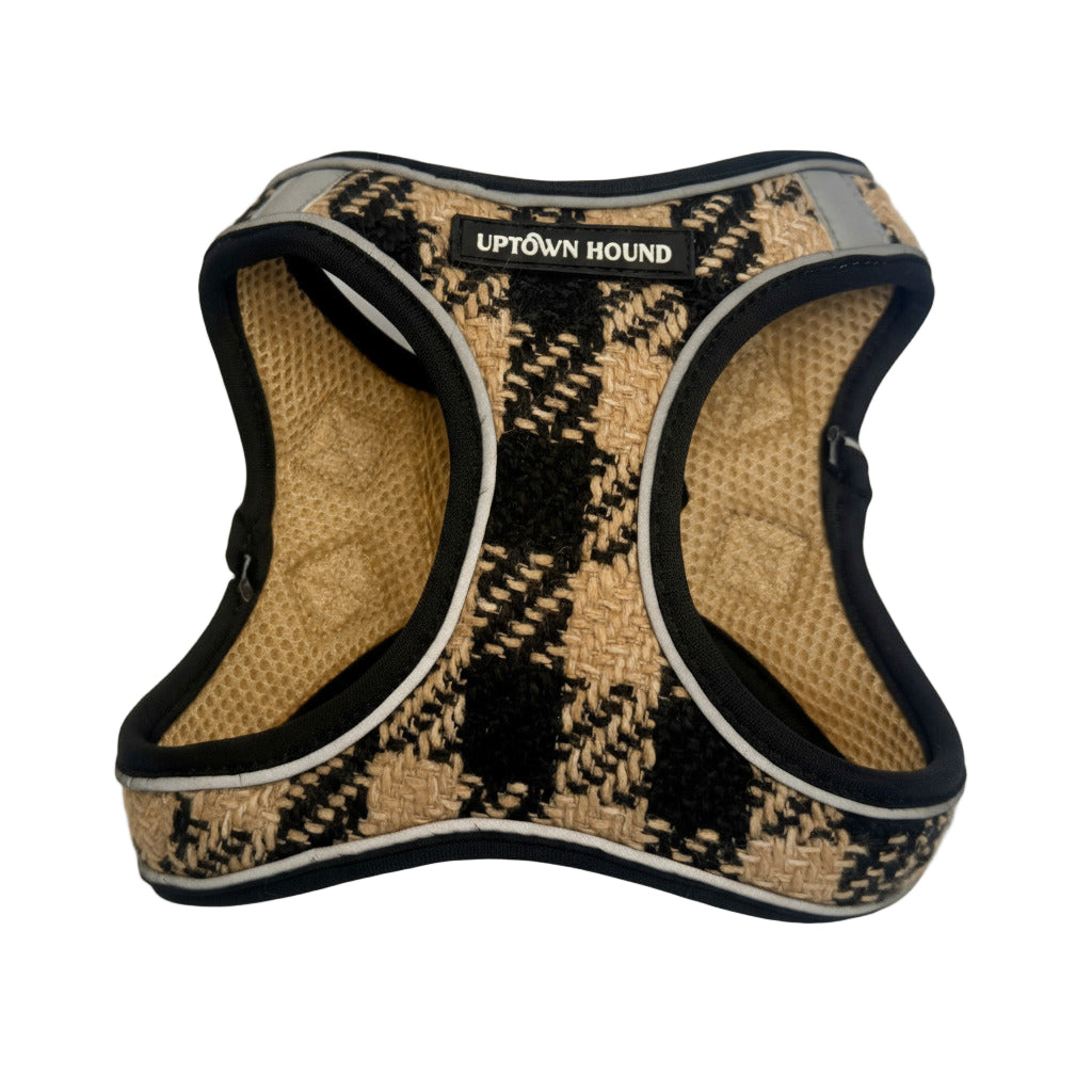 Dog harness with houndstooth pattern on a white background