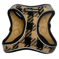 Dog harness with houndstooth pattern on a white background