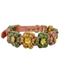 Dog collar with floral patterns on a light gray background