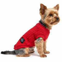 Yorkie side view in red cable-knit tee