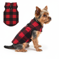 Yorkie Wearing Red & Black Plaid Vest with Vest in Background